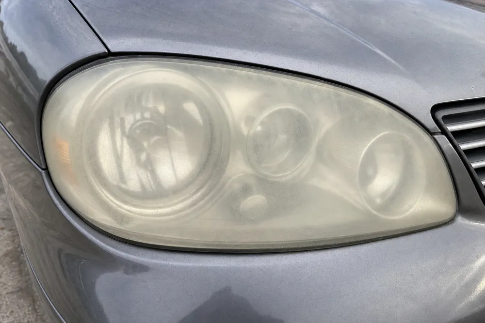 Cloudy, oxidized headlight lens before restoration